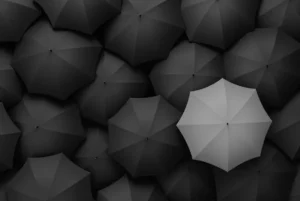 Dice spelling “CHANGE,” symbolizing a shift in how advisor models affect deal outcomes